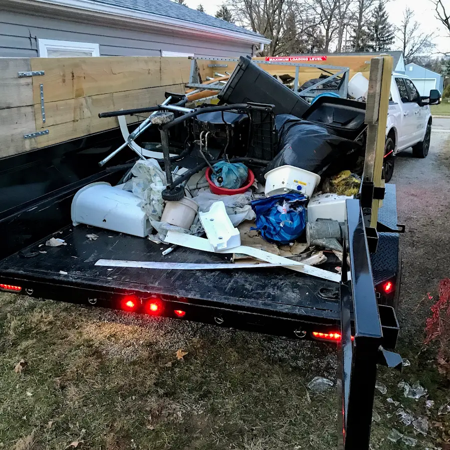 Roll-off dumpster delivered to a residential driveway in Lakeland